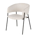 Chaise moderne en tissu bouclé blanc avec structure en métal noir.