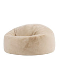 Pouf en velours beige avec un design confortable et ergonomique.