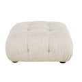 Pouf en tissu beige avec capitonnage et pieds en bois.