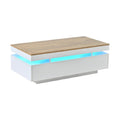 Table basse moderne avec éclairage LED intégré et plateau en bois clair.