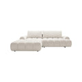 Canapé modulable en velours beige, design contemporain et confortable.